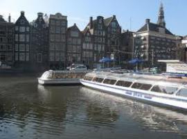 The old historical and cultural buildings is formed downtown of Amsterdam.